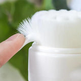 Brosse nettoyante et massante pour pate de chien